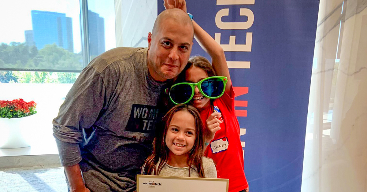 An image of Pete Torres, Capital One Software Engineering Director, with his two daughters